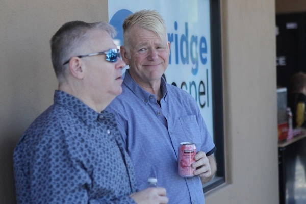Two men talking together